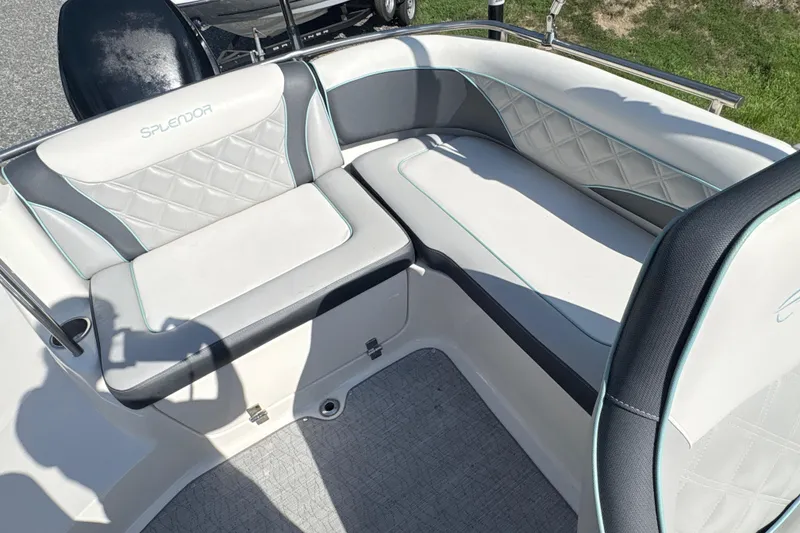 Slide: The Image of 2022 Splendor 239 Sunstar boat interior with stylish seating and elegant design. - 11
