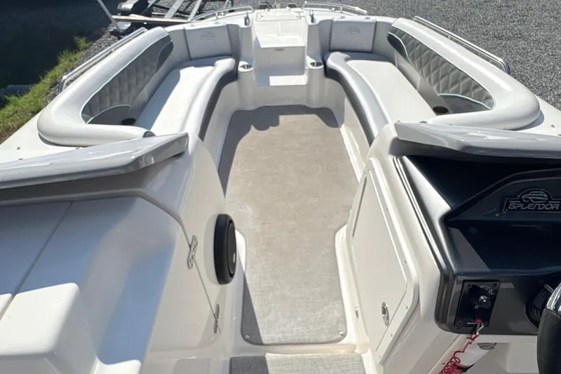 Slide: The Image of 2022 Splendor 239 Sunstar boat interior with spacious seating and modern design. - 17