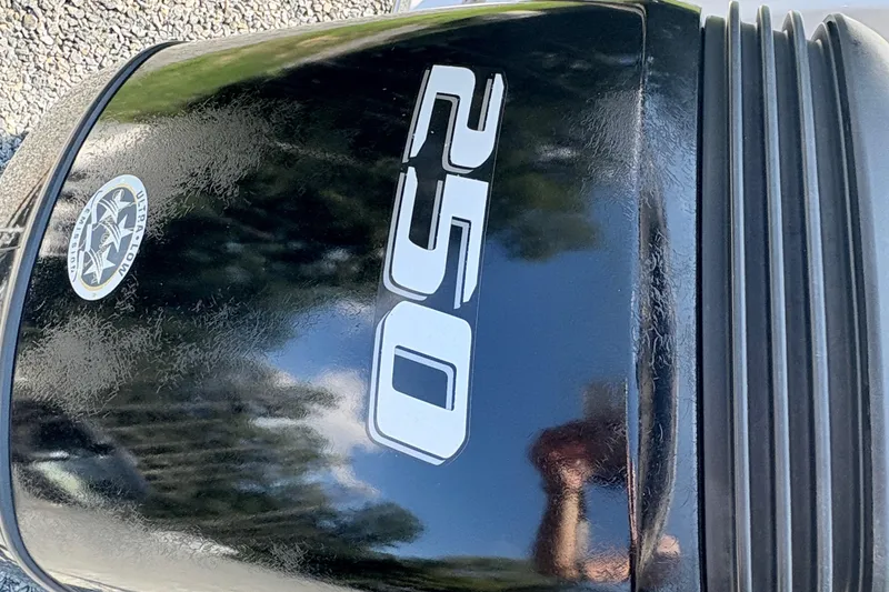 Slide: The Image of Close-up of a 250 horsepower outboard motor on a 2022 Splendor 239 Sunstar boat. - 9