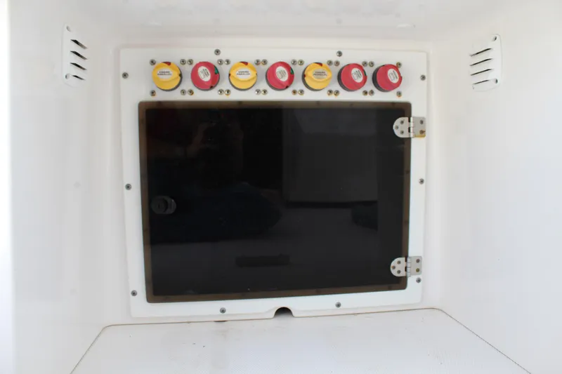 Slide: The Image of Electrical panel with switches on a 2016 Edgewater 370CC boat. - 10