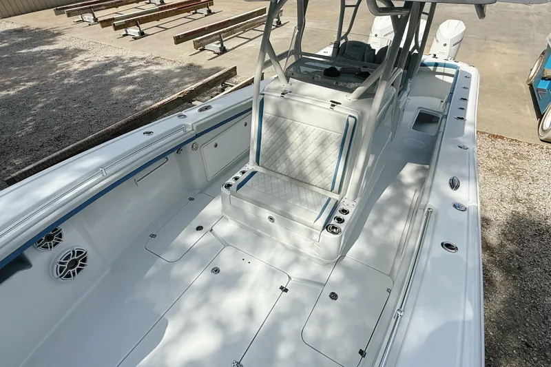 Slide: The Image of 2024 Yellowfin 36 Offshore boat interior with seating and storage compartments. - 4