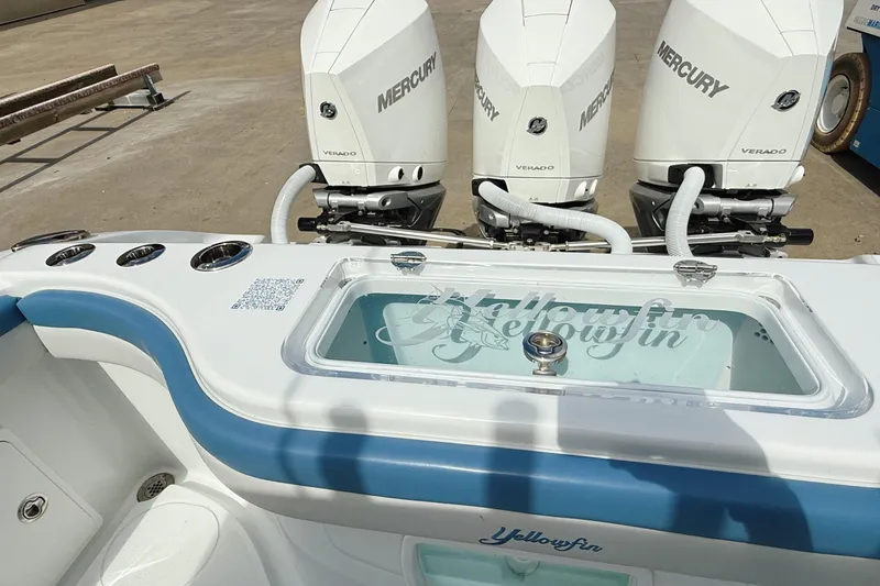 Slide: The Image of 2024 Yellowfin 36 Offshore boat with Mercury Verado engines and livewell. - 9