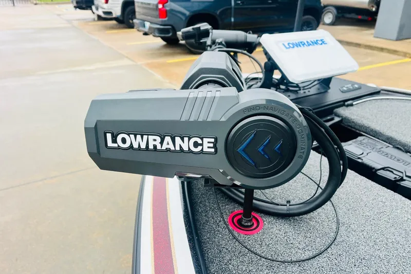Slide: The Image of Lowrance equipment on a 2021 Nitro Z19 Pro boat, parked in a lot. - 14