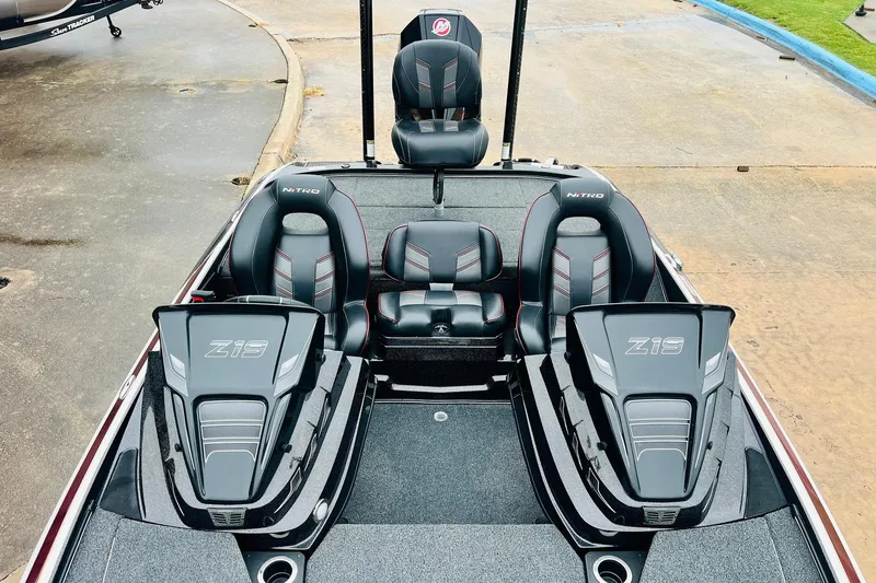 Slide: The Image of 2021 Nitro Z19 Pro boat interior with sleek black seating and modern design. - 25