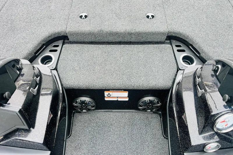 Slide: The Image of 2021 Nitro Z19 Pro boat interior with carpeted deck and cup holders. - 28