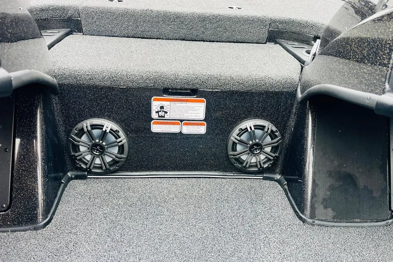 Slide: The Image of 2021 Nitro Z19 Pro boat interior with speakers and warning labels. - 39