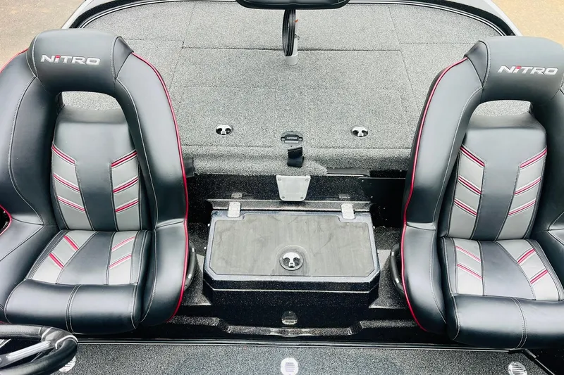 Slide: The Image of Two black and red Nitro Z19 Pro boat seats, 2021 model, with center console. - 41