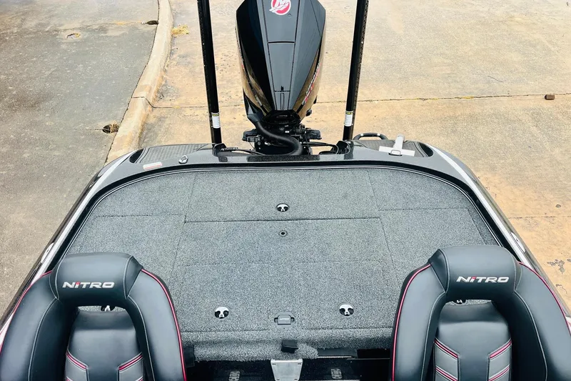 Slide: The Image of 2021 Nitro Z19 Pro boat interior with dual seats and motor view. - 44