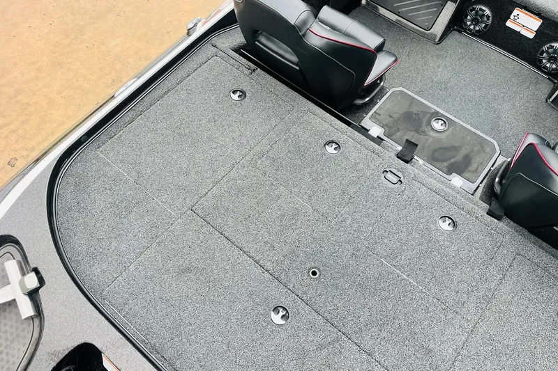 Slide: The Image of Interior view of 2021 Nitro Z19 Pro boat, featuring spacious carpeted deck and seating. - 49