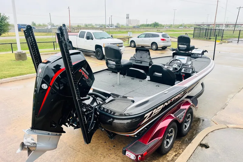 Slide: The Image of 2021 Nitro Z19 Pro boat with powerful engine and sleek design on a trailer. - 5