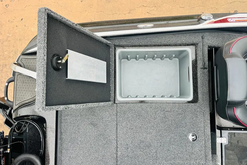 Slide: The Image of 2021 Nitro Z19 Pro boat storage compartment with open lid and seating area. - 51