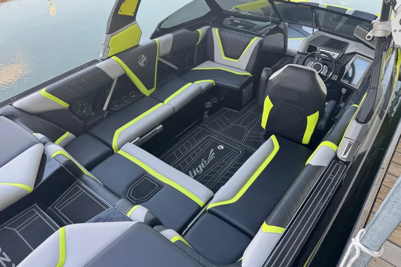 Slide: The Image of 2020 Tigé 23RZX boat interior with modern seating and sleek design. - 3