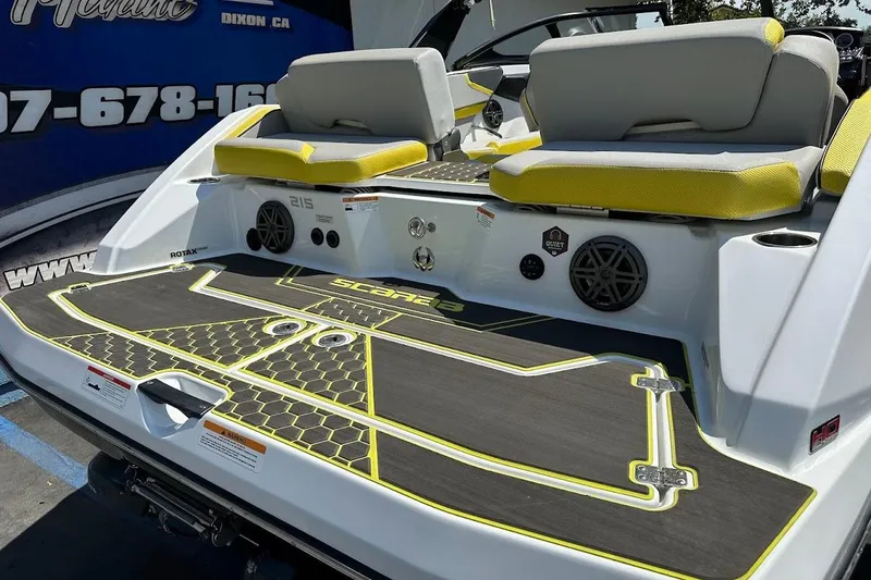 Slide: The Image of 2023 Scarab 215 ID boat with stylish seating and modern design features. - 36