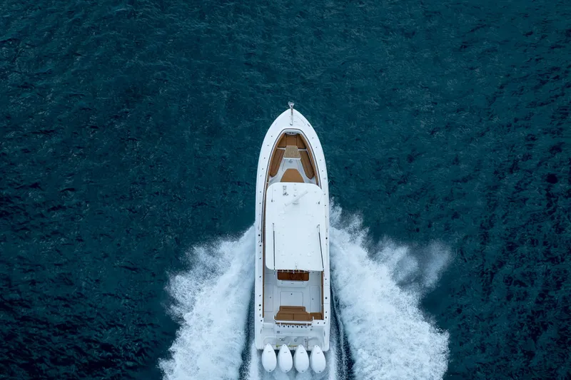 Slide: The Image of Aerial view of 2020 HCB 42 Lujo yacht cruising on open water. - 5