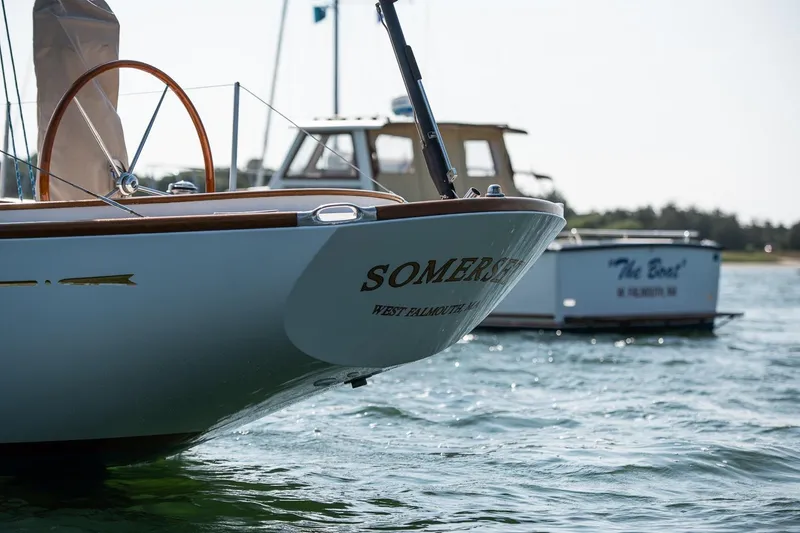 Slide: The Image of 2006 Morris M36 Daysailer named Somerset on calm water, with another boat in the background. - 15