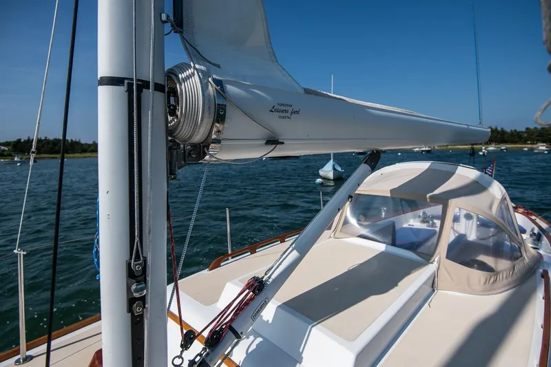 Slide: The Image of 2006 Morris M36 Daysailer with sails, docked on a sunny day. - 17