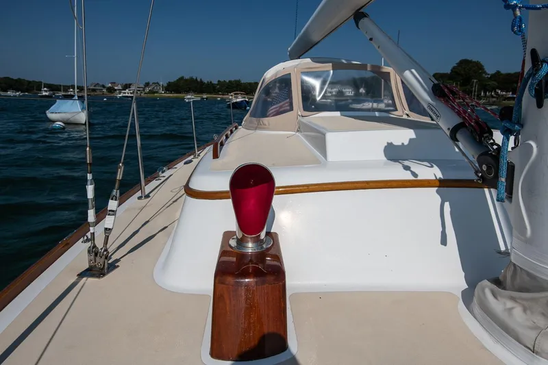 Slide: The Image of 2006 Morris M36 Daysailer on water, showcasing deck and rigging details. - 19