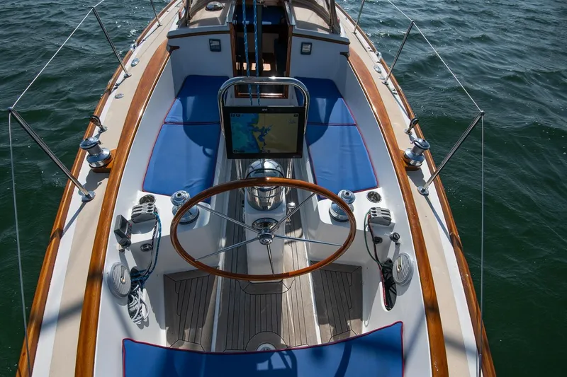 Slide: The Image of Cockpit of 2006 Morris M36 Daysailer with wooden accents and navigation equipment. - 25