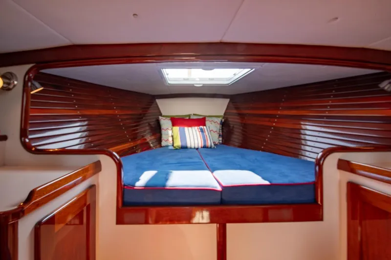 Slide: The Image of Interior cabin of 2006 Morris M36 Daysailer with cozy bedding and wooden finish. - 39