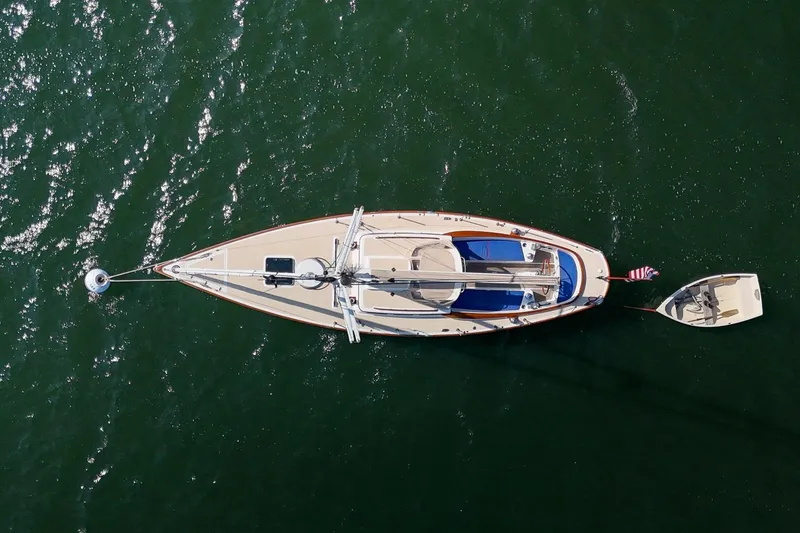 Slide: The Image of Aerial view of 2006 Morris M36 Daysailer on calm green water. - 6