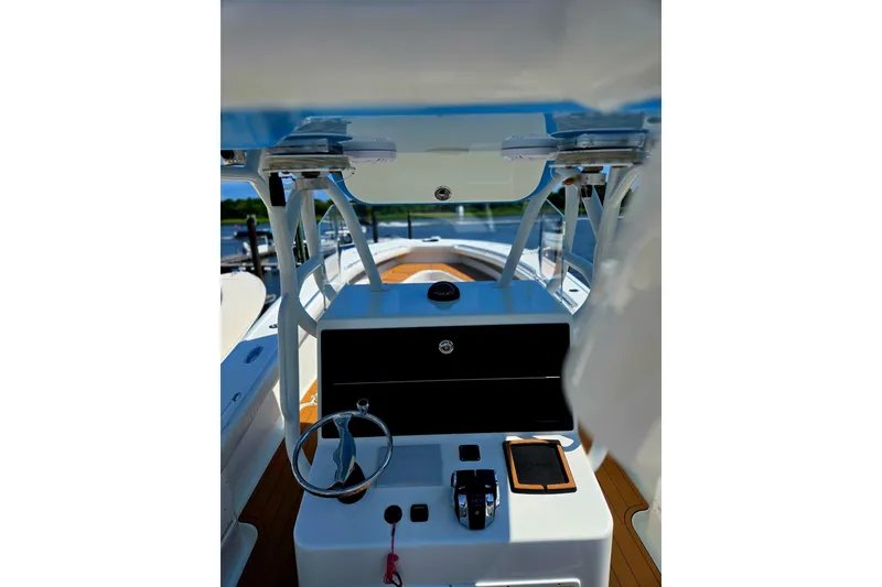 Slide: The Image of 2007 Yellowfin 36 boat interior with steering wheel and control panel. - 3