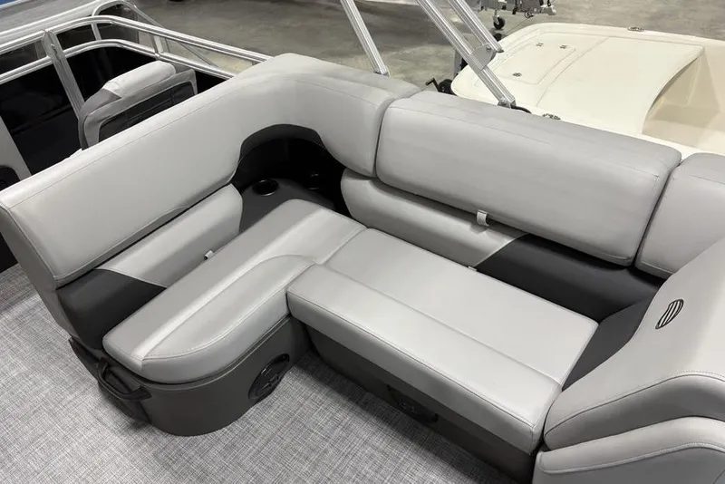 Slide: The Image of Storage compartment of 2026 Sun Tracker SportFish 20 DLX boat, open and empty. - 10