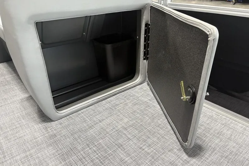 Slide: The Image of 2026 Sun Tracker SportFish 20 DLX steering console with modern controls and display. - 11