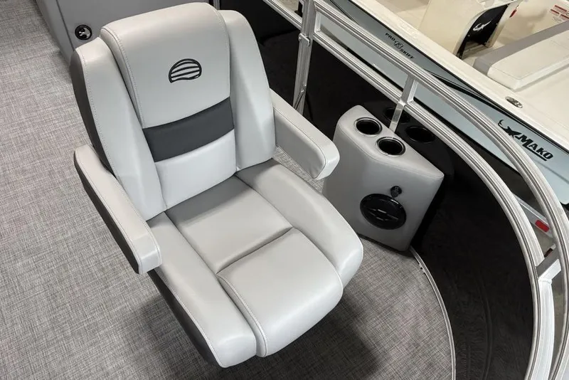 Slide: The Image of 2026 Sun Tracker SportFish 20 DLX storage compartment with open lid, showcasing interior space. - 13