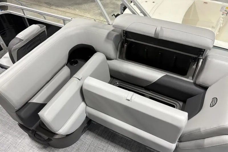 Slide: The Image of 2026 Sun Tracker SportFish 20 DLX boat interior with open storage compartment. - 16