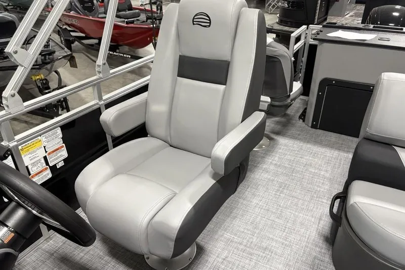 Slide: The Image of Control panel of 2026 Sun Tracker SportFish 20 DLX boat with throttle lever. - 17