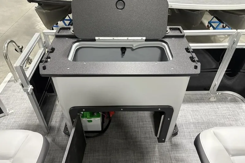 Slide: The Image of 2026 Sun Tracker SportFish 20 DLX boat seat, gray and white upholstery, modern design. - 26