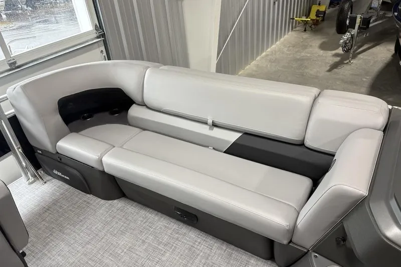 Slide: The Image of Storage compartment with black bin in 2026 Sun Tracker SportFish 20 DLX boat. - 8