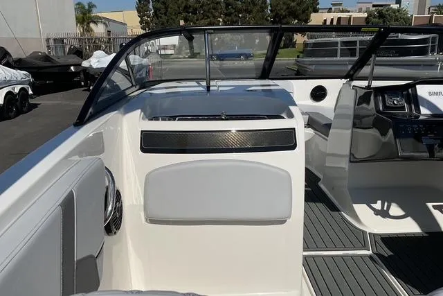 Slide: The Image of 2025 Bayliner VR6 Bowrider I/O interior with sleek design and modern dashboard. - 15