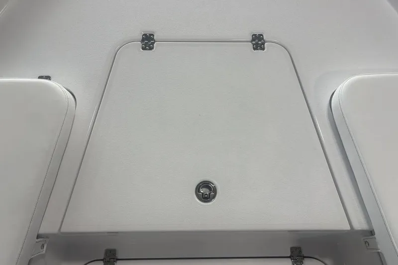 Slide: The Image of 2026 Sportsman Masters 227 boat storage compartment with secure latch and sleek design. - 13