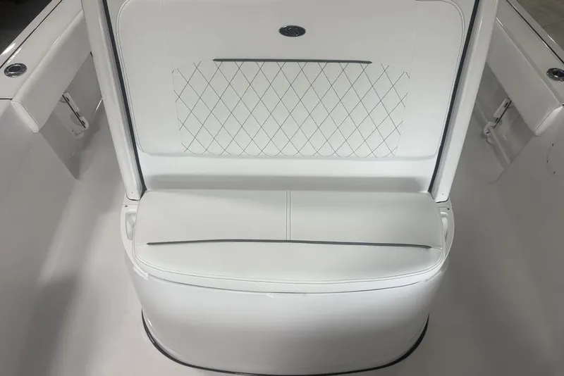 Slide: The Image of 2026 Sportsman Masters 227 boat seat with white upholstery and diamond stitching. - 17
