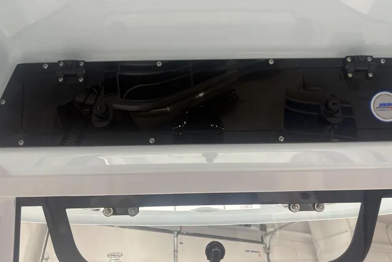 Slide: The Image of 2026 Sportsman Masters 227 boat interior detail with control panel and equipment. - 25