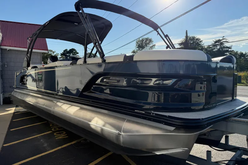 Slide: The Image of 2025 Avalon 2785 Excalibur LTD Tri Toon boat with Mercury 400hp V-10 engine. - 10