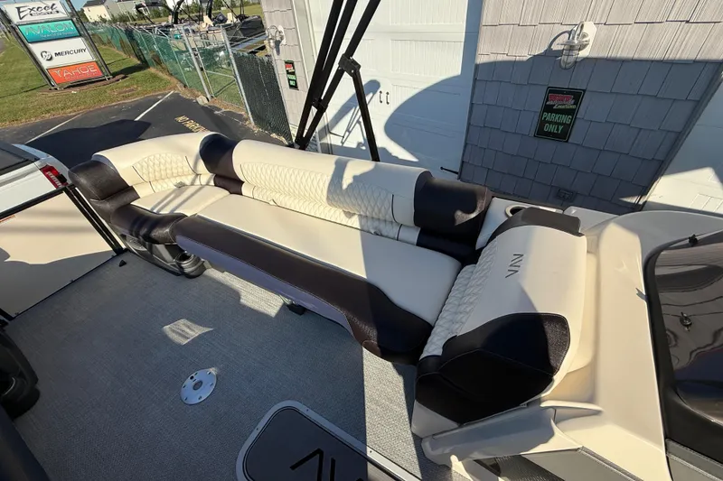 Slide: The Image of Luxurious seating on 2025 Avalon 2785 Excalibur LTD Tri Toon boat, featuring premium upholstery. - 15
