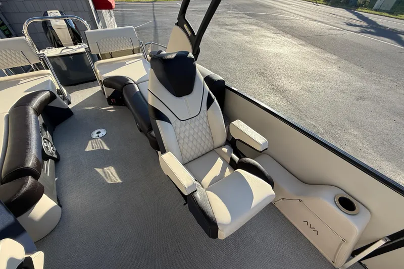 Slide: The Image of Luxurious seating on 2025 Avalon 2785 Excalibur LTD Tri Toon boat, featuring high-performance design. - 21