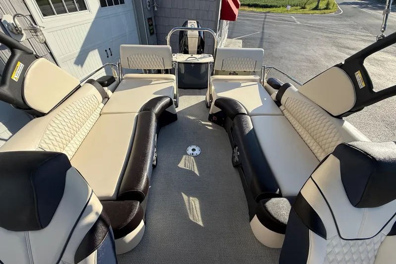 Slide: The Image of Luxurious seating on 2025 Avalon 2785 Excalibur LTD Tri Toon boat, featuring high-performance design. - 22