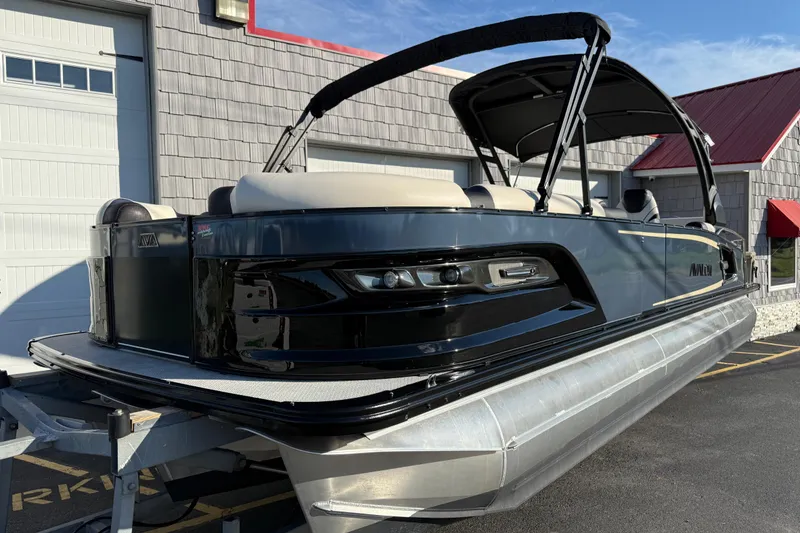 Slide: The Image of 2025 Avalon 2785 Excalibur LTD Tri Toon boat with Mercury 400hp V-10 engine. - 3