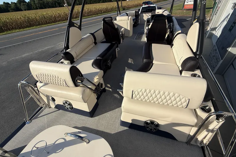 Slide: The Image of Luxurious 2025 Avalon 2785 Excalibur LTD boat interior with plush seating and high-performance features. - 31