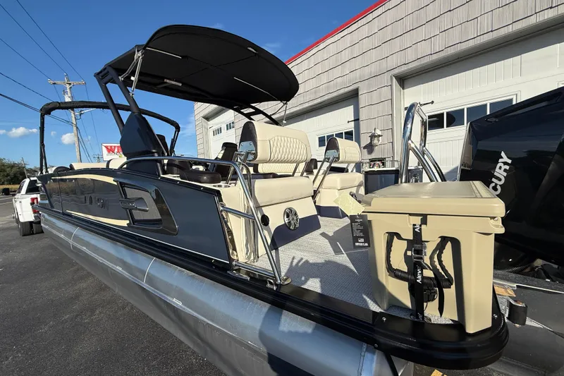 Slide: The Image of 2025 Avalon 2785 Excalibur LTD Tri Toon boat with Mercury 400hp V-10 engine. - 32