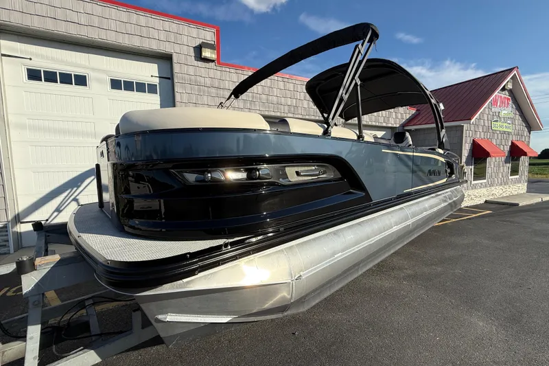 Slide: The Image of 2025 Avalon 2785 Excalibur LTD Tri Toon boat with Mercury 400hp V-10 engine. - 33