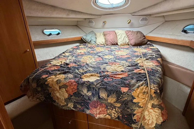 Slide: The Image of Cozy bedroom in 1999 Bayliner 3788 Command Bridge Motoryacht with floral bedding. - 40