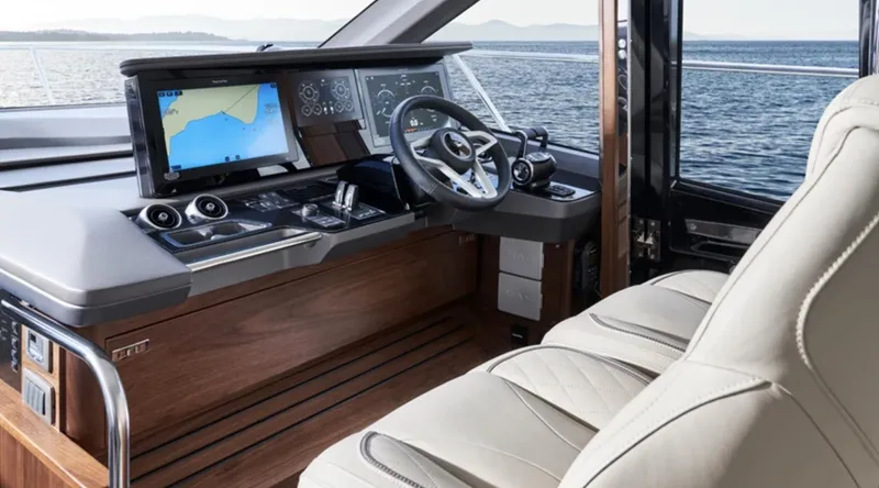 Slide: The Image of Luxurious 2025 Princess F65 yacht cockpit with modern navigation system and leather seating. - 14