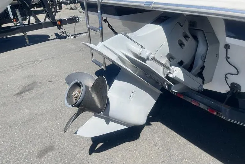 Slide: The Image of 1997 Reinell 240 boat propeller and outdrive on a trailer. - 5