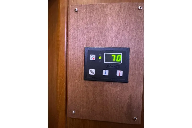Slide: The Image of Digital thermostat on wooden panel in 2001 Jupiter 35 Convertible boat. - 27