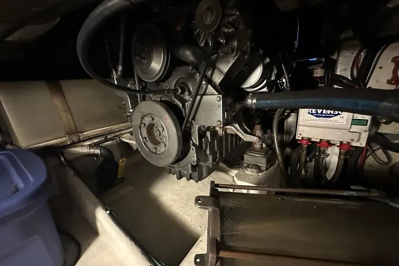 Slide: The Image of Engine compartment of a 2001 Jupiter 35 Convertible boat, showcasing mechanical components. - 30