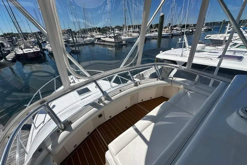 Slide: The Image of Luxurious 2001 Jupiter 35 Convertible yacht interior with marina view. - 38